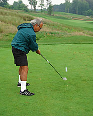 Billy Hinsche golfing